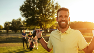 Happy Man Playing Golf | Imagen Dental Partners