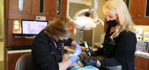 Doctors Checking patient teeth